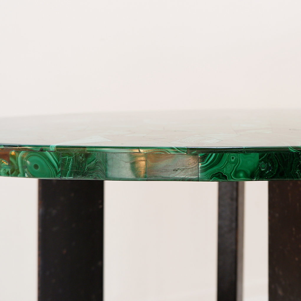 Console table with malachite top on double tripod base in black metal