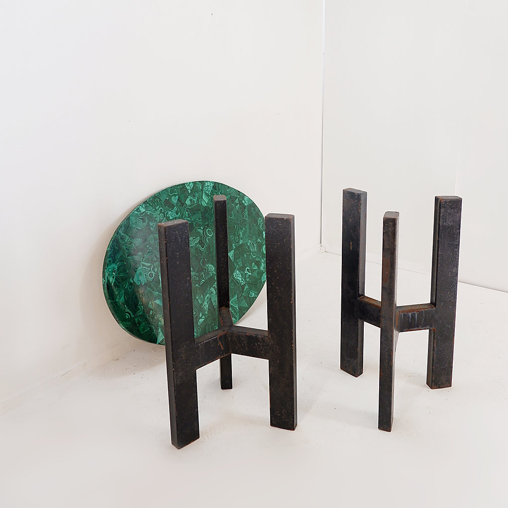 Console table with malachite top on double tripod base in black metal