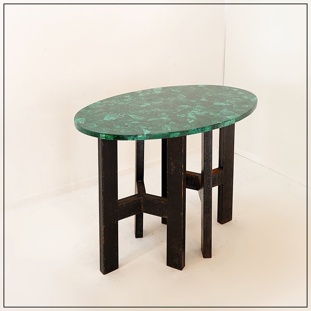 Console table with malachite top on double tripod base in black metal