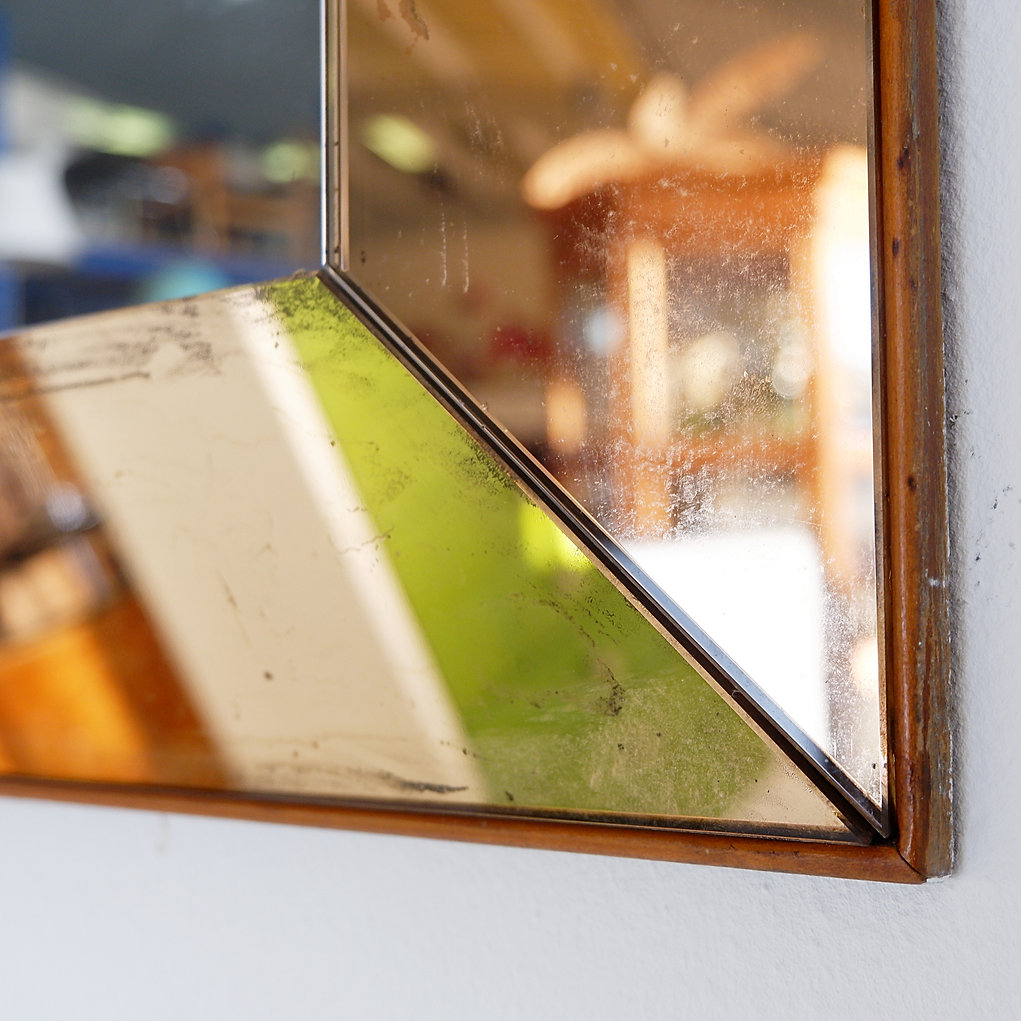 Mid-century modern mirror in the style of Jacques Adnet