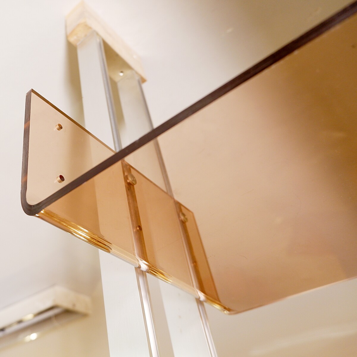 modular floor/ceiling shelf in brushed metal and acrylic in the spirit of Michel Ducaroy