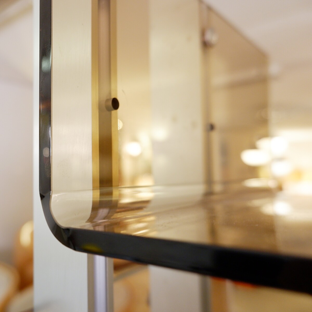 modular floor/ceiling shelf in brushed metal and acrylic in the spirit of Michel Ducaroy