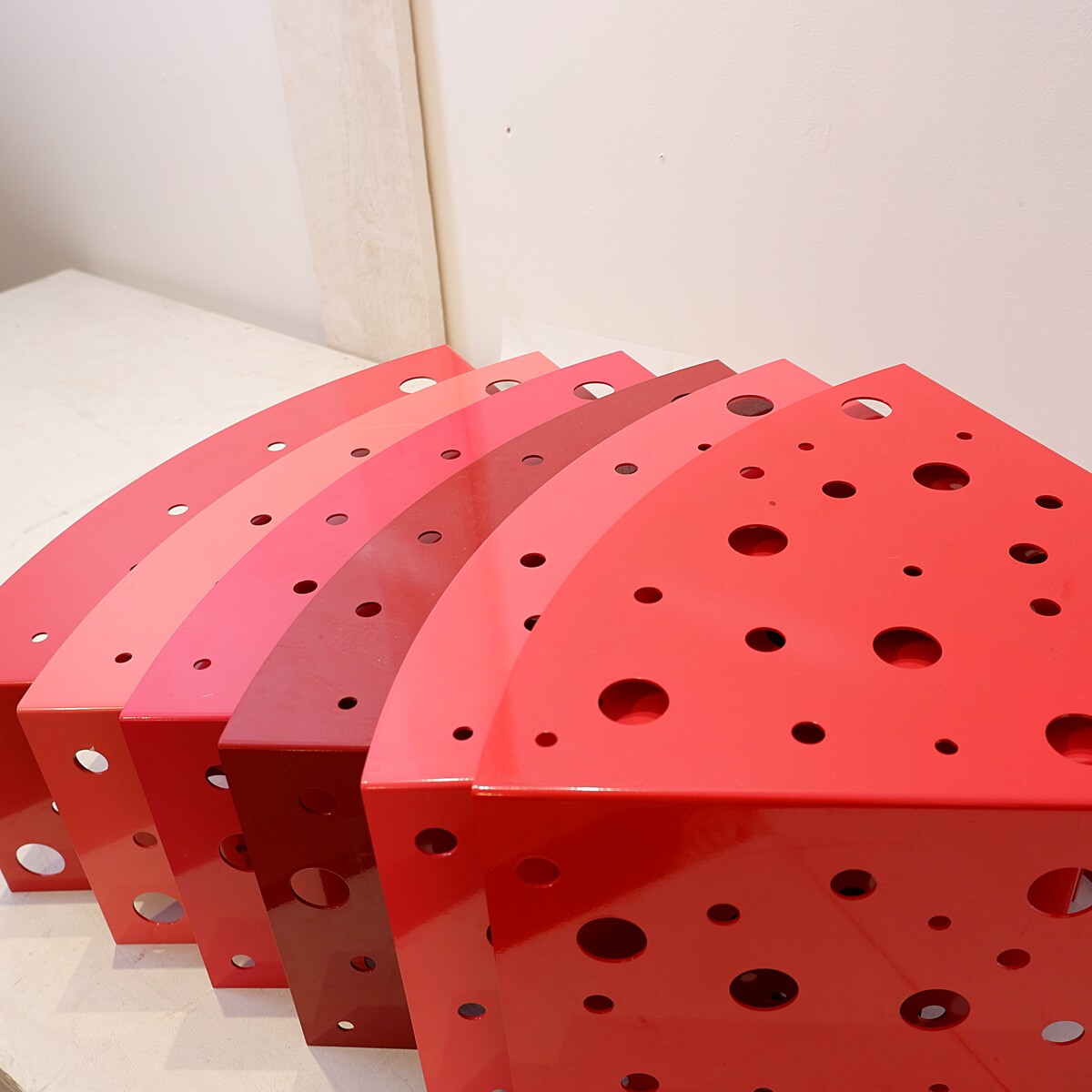 Modular indoor and outdoor coffee tables in red gradient lacquered metal