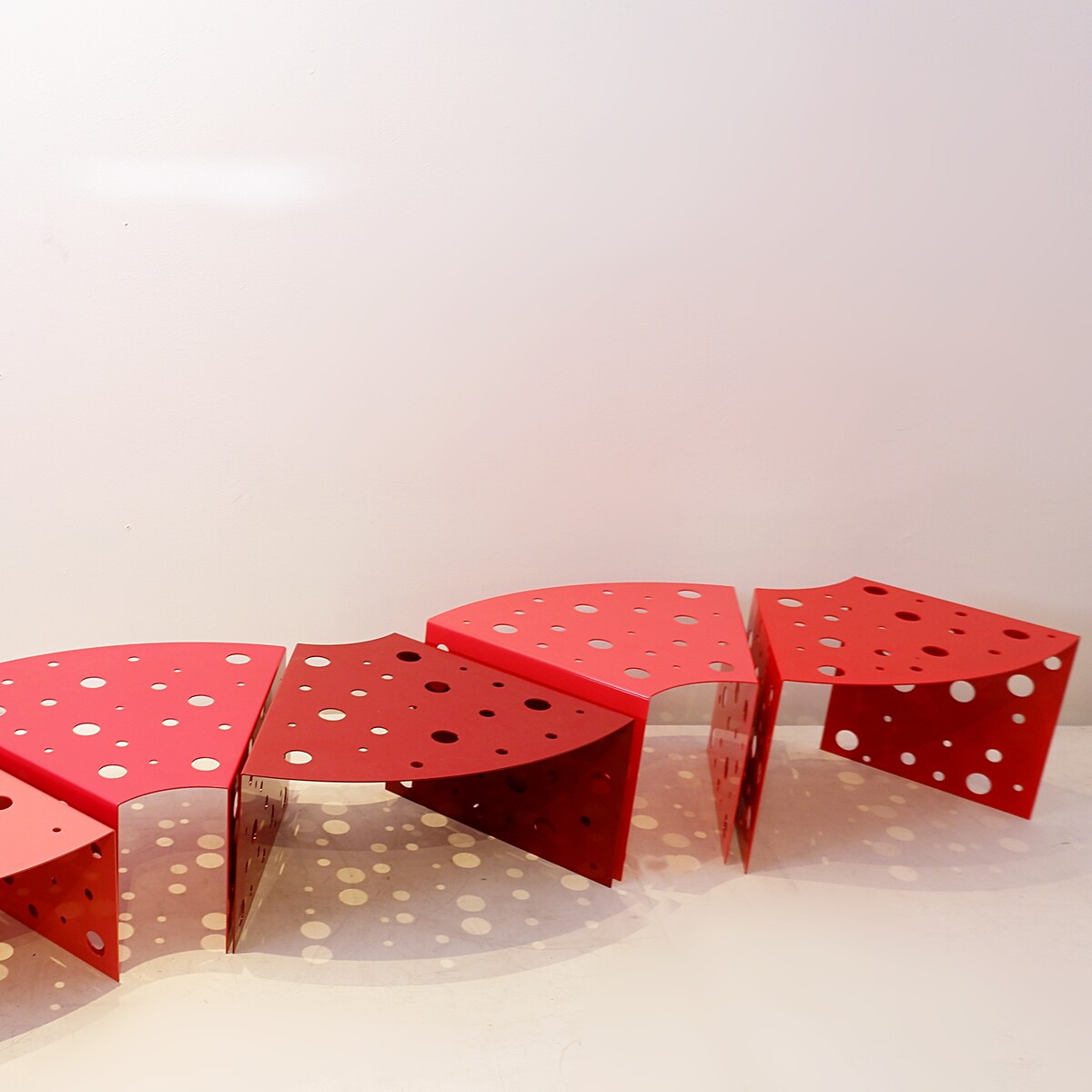 Modular indoor and outdoor coffee tables in red gradient lacquered metal