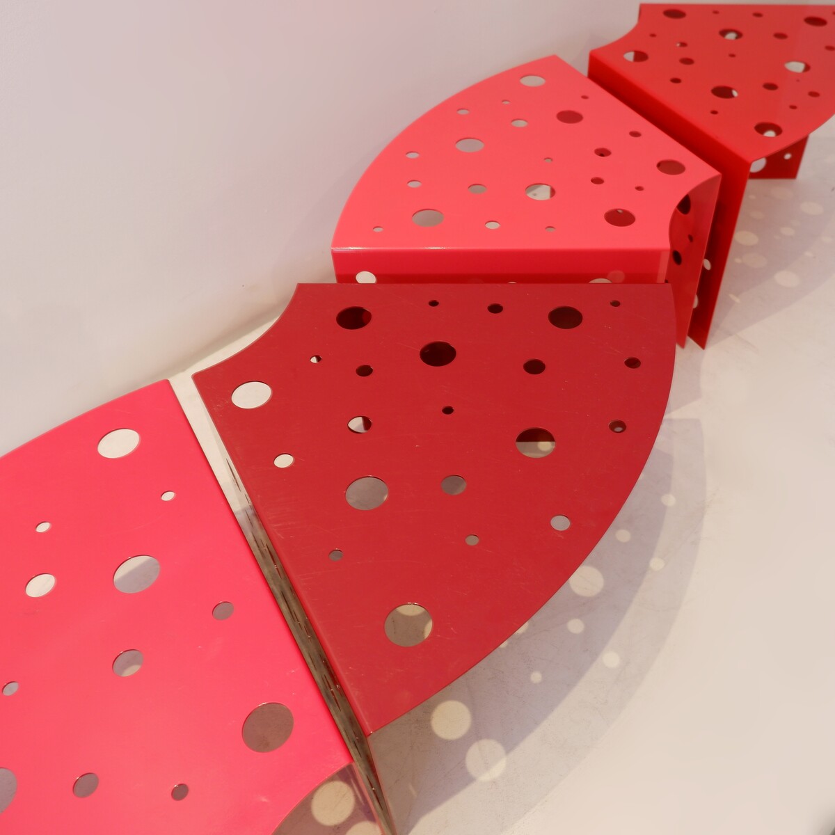 Modular indoor and outdoor coffee tables in red gradient lacquered metal