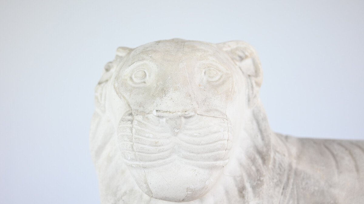 Reclining lion, vintage reproduction in plaster, France, 1970's