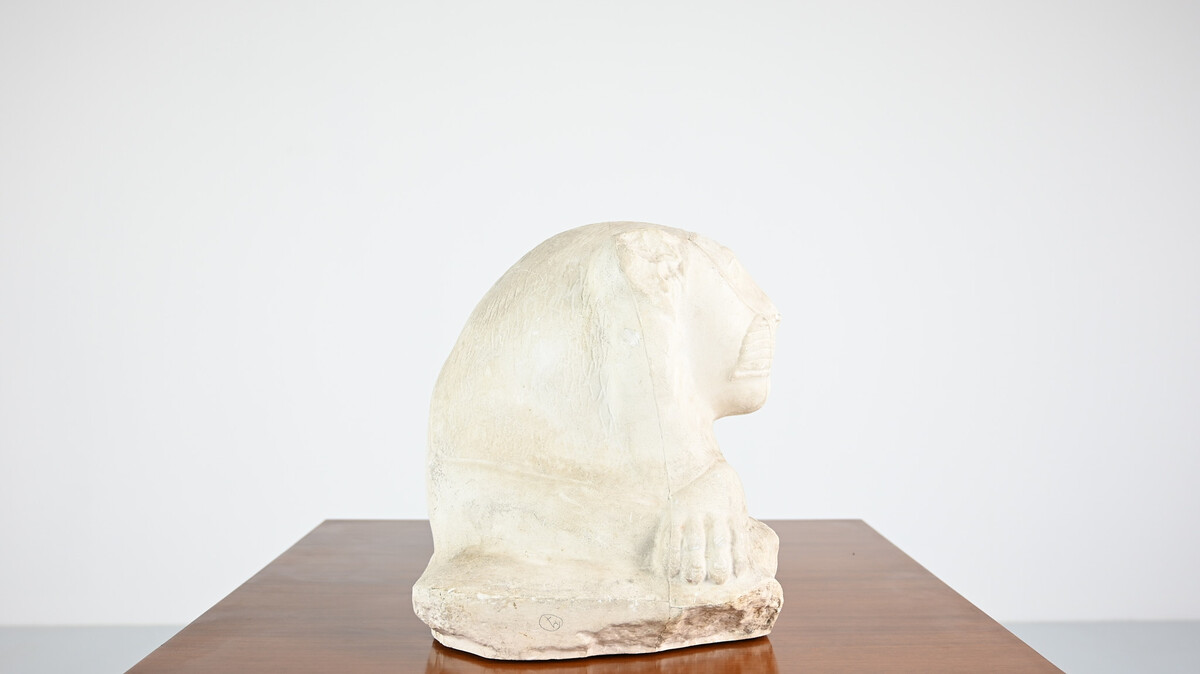 Reclining lion, vintage reproduction in plaster, France, 1970's