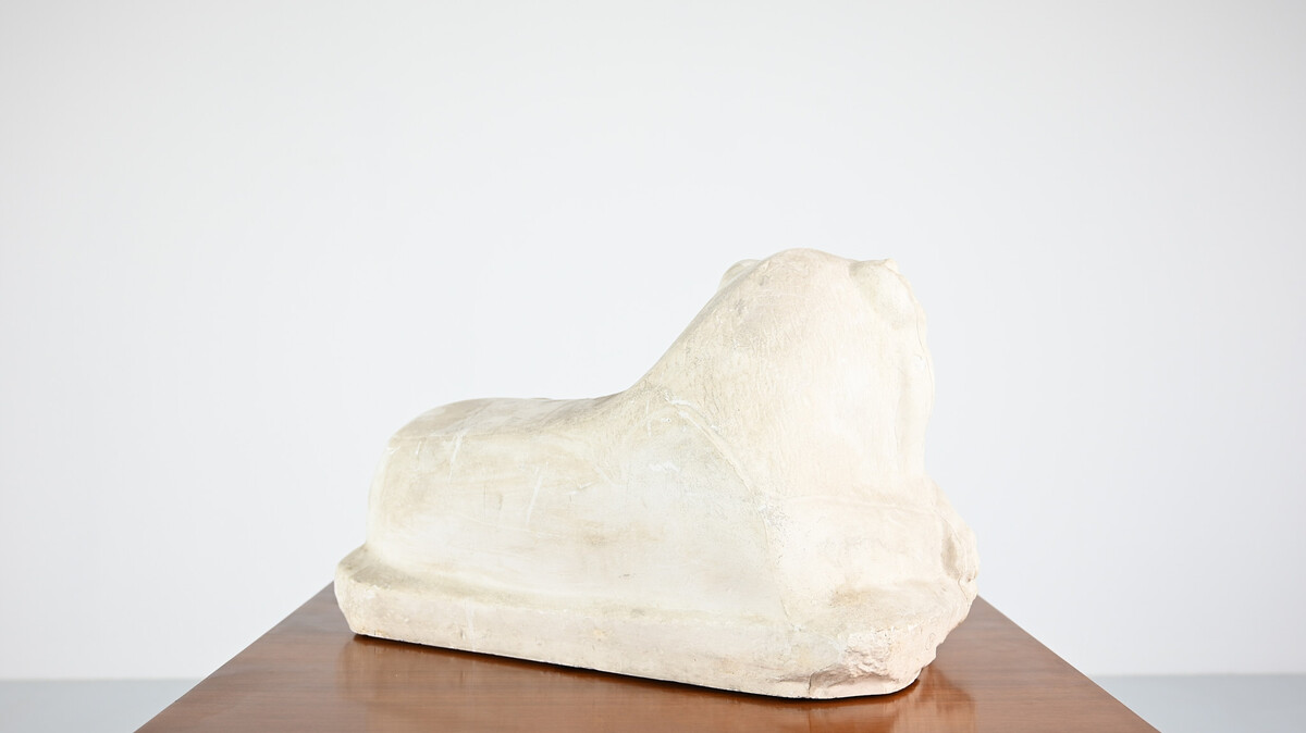 Reclining lion, vintage reproduction in plaster, France, 1970's